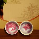 宝石红釉下青花龙凤对杯